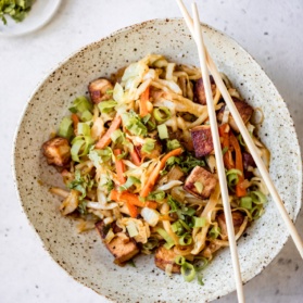 vegan egg roll in a bowl with chopsticks