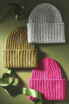 three beanies in different colors