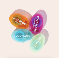 four colorful floss containers